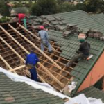 Tiro Bokone Roof laying Image